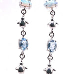 Aretes largos Principito con aguamarinas y opalo - Paula Guzmán